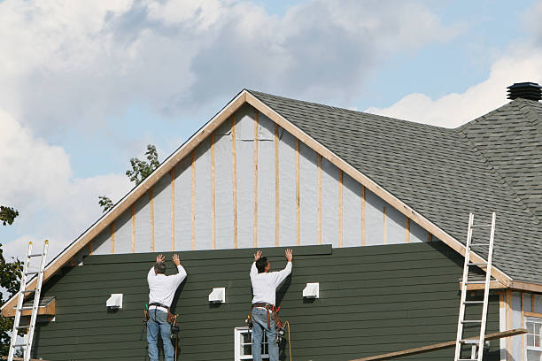 Professional Siding Installation technician working in Concord, PA